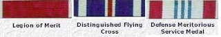 Legion of Merit; Distinguished Flying Cross; Defense Meritorious Service